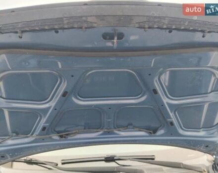 Синий Хендай Туксон, объемом двигателя 1.98 л и пробегом 201 тыс. км за 9400 $, фото 3 на Automoto.ua