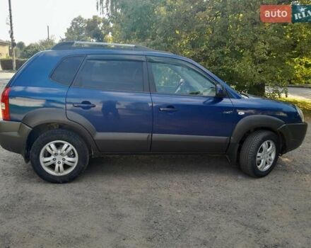 Синій Хендай Туксон, об'ємом двигуна 1.99 л та пробігом 175 тис. км за 7600 $, фото 4 на Automoto.ua