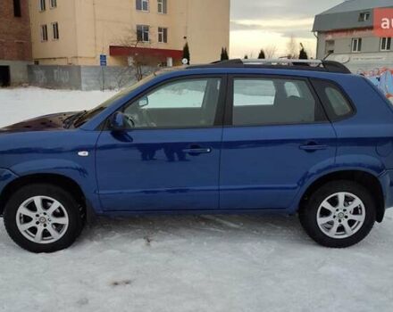 Синий Хендай Туксон, объемом двигателя 1.98 л и пробегом 228 тыс. км за 7700 $, фото 2 на Automoto.ua