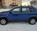 Синий Хендай Туксон, объемом двигателя 1.98 л и пробегом 228 тыс. км за 7700 $, фото 2 на Automoto.ua