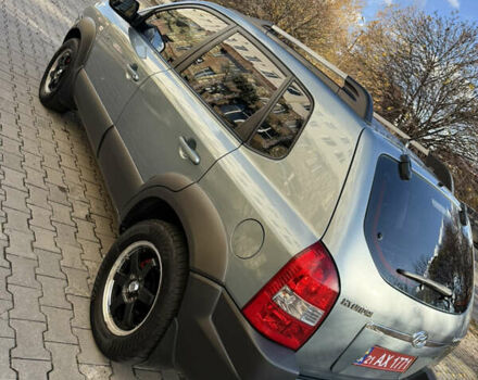 Синій Хендай Туксон, об'ємом двигуна 2 л та пробігом 203 тис. км за 7800 $, фото 4 на Automoto.ua