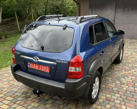 Синий Хендай Туксон, объемом двигателя 1.98 л и пробегом 230 тыс. км за 6555 $, фото 5 на Automoto.ua