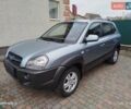 Синий Хендай Туксон, объемом двигателя 2 л и пробегом 213 тыс. км за 8900 $, фото 1 на Automoto.ua