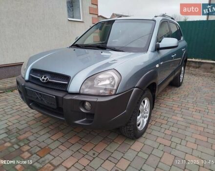 Синий Хендай Туксон, объемом двигателя 2 л и пробегом 213 тыс. км за 8900 $, фото 3 на Automoto.ua
