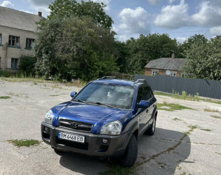 Синий Хендай Туксон, объемом двигателя 1.98 л и пробегом 220 тыс. км за 8000 $, фото 1 на Automoto.ua