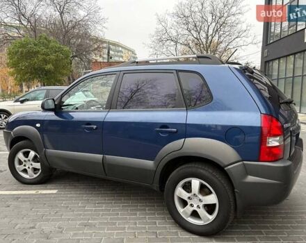 Синий Хендай Туксон, объемом двигателя 1.98 л и пробегом 163 тыс. км за 7990 $, фото 14 на Automoto.ua