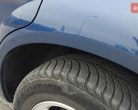 Синий Хендай Туксон, объемом двигателя 1.98 л и пробегом 201 тыс. км за 9400 $, фото 12 на Automoto.ua