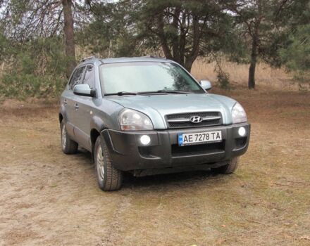 Синий Хендай Туксон, объемом двигателя 2 л и пробегом 180 тыс. км за 8000 $, фото 3 на Automoto.ua