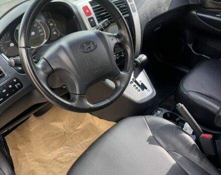 Синий Хендай Туксон, объемом двигателя 2 л и пробегом 198 тыс. км за 7999 $, фото 4 на Automoto.ua