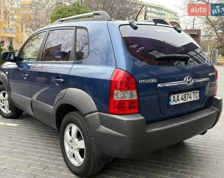 Синий Хендай Туксон, объемом двигателя 1.98 л и пробегом 163 тыс. км за 7990 $, фото 4 на Automoto.ua