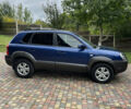 Синий Хендай Туксон, объемом двигателя 1.98 л и пробегом 230 тыс. км за 6555 $, фото 4 на Automoto.ua