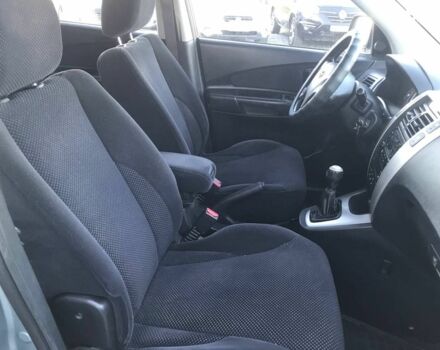 Синий Хендай Туксон, объемом двигателя 2 л и пробегом 207 тыс. км за 7990 $, фото 11 на Automoto.ua