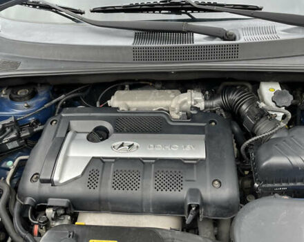 Синий Хендай Туксон, объемом двигателя 1.98 л и пробегом 230 тыс. км за 6555 $, фото 16 на Automoto.ua