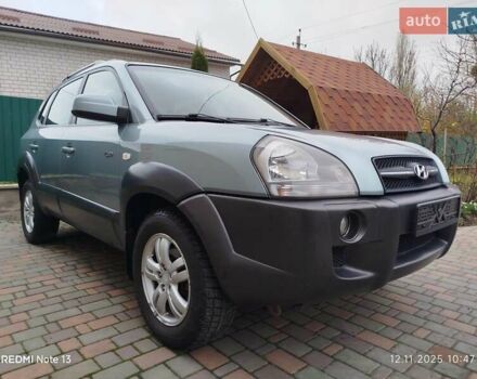 Синий Хендай Туксон, объемом двигателя 2 л и пробегом 213 тыс. км за 8900 $, фото 8 на Automoto.ua