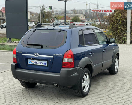 Синий Хендай Туксон, объемом двигателя 1.98 л и пробегом 163 тыс. км за 8000 $, фото 4 на Automoto.ua