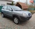 Синий Хендай Туксон, объемом двигателя 2 л и пробегом 213 тыс. км за 8900 $, фото 96 на Automoto.ua