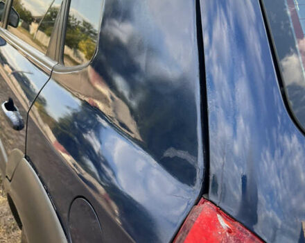 Синий Хендай Туксон, объемом двигателя 1.98 л и пробегом 210 тыс. км за 4500 $, фото 7 на Automoto.ua