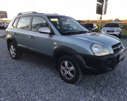 Синий Хендай Туксон, объемом двигателя 2 л и пробегом 207 тыс. км за 6890 $, фото 13 на Automoto.ua