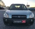 Синий Хендай Туксон, объемом двигателя 2 л и пробегом 207 тыс. км за 6890 $, фото 2 на Automoto.ua