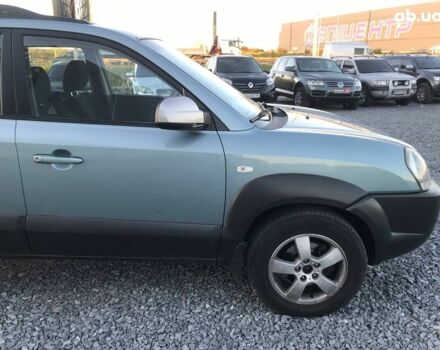 Синий Хендай Туксон, объемом двигателя 2 л и пробегом 207 тыс. км за 7990 $, фото 15 на Automoto.ua