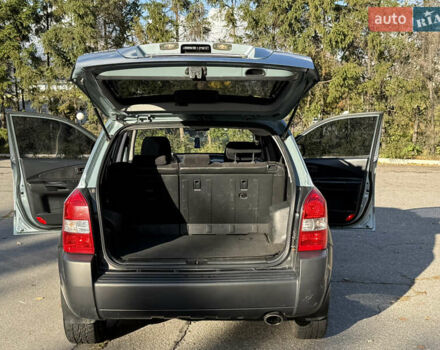 Синий Хендай Туксон, объемом двигателя 2 л и пробегом 204 тыс. км за 7350 $, фото 26 на Automoto.ua