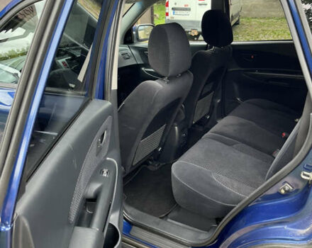 Синий Хендай Туксон, объемом двигателя 1.98 л и пробегом 230 тыс. км за 6555 $, фото 7 на Automoto.ua