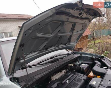 Синий Хендай Туксон, объемом двигателя 2 л и пробегом 213 тыс. км за 8900 $, фото 82 на Automoto.ua