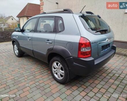 Синий Хендай Туксон, объемом двигателя 2 л и пробегом 213 тыс. км за 8900 $, фото 15 на Automoto.ua