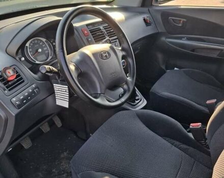 Синій Хендай Туксон, об'ємом двигуна 2 л та пробігом 158 тис. км за 8500 $, фото 11 на Automoto.ua