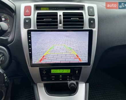 Синий Хендай Туксон, объемом двигателя 1.98 л и пробегом 163 тыс. км за 8000 $, фото 22 на Automoto.ua