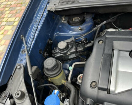 Синий Хендай Туксон, объемом двигателя 1.98 л и пробегом 230 тыс. км за 6555 $, фото 17 на Automoto.ua