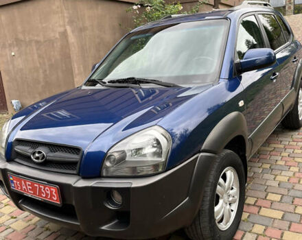Синий Хендай Туксон, объемом двигателя 1.98 л и пробегом 230 тыс. км за 6555 $, фото 1 на Automoto.ua