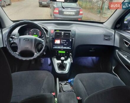 Синий Хендай Туксон, объемом двигателя 2 л и пробегом 170 тыс. км за 8500 $, фото 5 на Automoto.ua