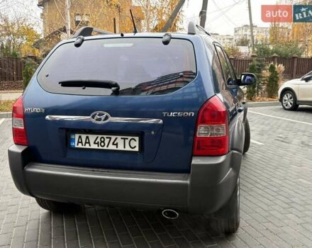 Синий Хендай Туксон, объемом двигателя 1.98 л и пробегом 163 тыс. км за 7990 $, фото 13 на Automoto.ua