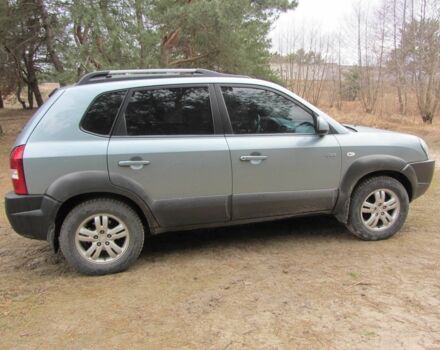 Синий Хендай Туксон, объемом двигателя 2 л и пробегом 180 тыс. км за 8000 $, фото 5 на Automoto.ua