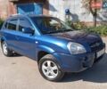 Синий Хендай Туксон, объемом двигателя 1.98 л и пробегом 250 тыс. км за 7700 $, фото 1 на Automoto.ua