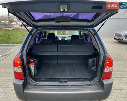 Синий Хендай Туксон, объемом двигателя 1.98 л и пробегом 163 тыс. км за 8000 $, фото 14 на Automoto.ua