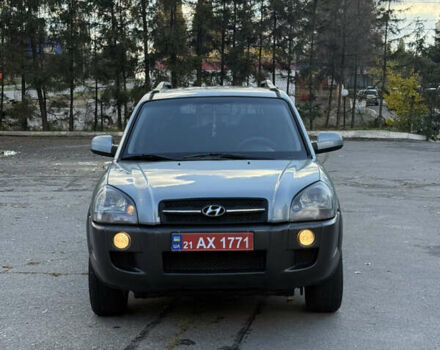 Синий Хендай Туксон, объемом двигателя 2 л и пробегом 205 тыс. км за 7500 $, фото 5 на Automoto.ua