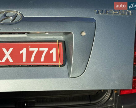 Синій Хендай Туксон, об'ємом двигуна 2 л та пробігом 203 тис. км за 7800 $, фото 20 на Automoto.ua