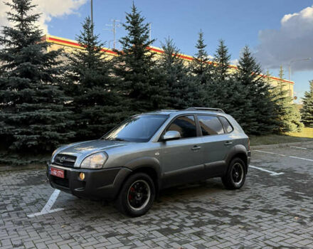 Синий Хендай Туксон, объемом двигателя 2 л и пробегом 205 тыс. км за 7500 $, фото 13 на Automoto.ua