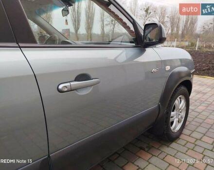 Синий Хендай Туксон, объемом двигателя 2 л и пробегом 213 тыс. км за 8900 $, фото 30 на Automoto.ua
