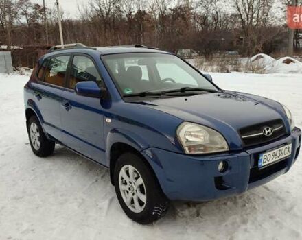 Синий Хендай Туксон, объемом двигателя 1.98 л и пробегом 228 тыс. км за 7700 $, фото 3 на Automoto.ua