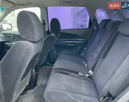 Синий Хендай Туксон, объемом двигателя 1.98 л и пробегом 163 тыс. км за 8000 $, фото 12 на Automoto.ua