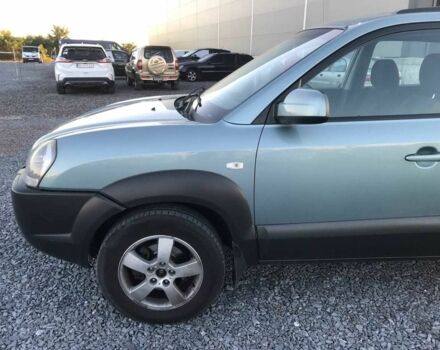 Синий Хендай Туксон, объемом двигателя 2 л и пробегом 207 тыс. км за 6890 $, фото 21 на Automoto.ua