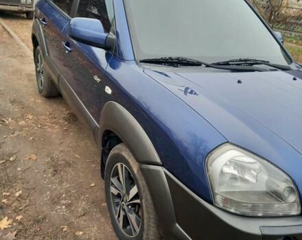 Синий Хендай Туксон, объемом двигателя 2 л и пробегом 170 тыс. км за 8500 $, фото 6 на Automoto.ua