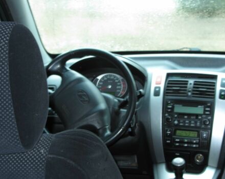 Синий Хендай Туксон, объемом двигателя 2 л и пробегом 180 тыс. км за 8000 $, фото 9 на Automoto.ua