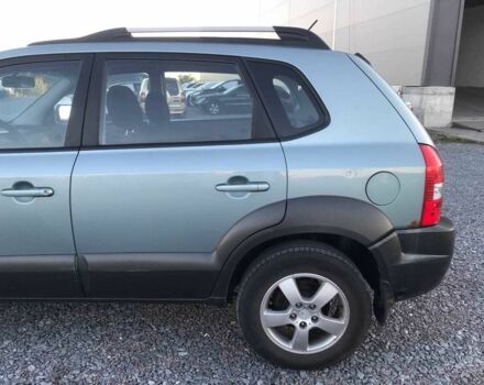 Синий Хендай Туксон, объемом двигателя 2 л и пробегом 207 тыс. км за 6890 $, фото 20 на Automoto.ua