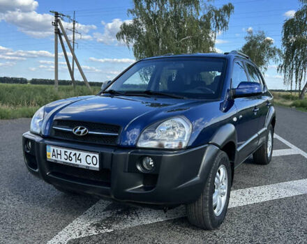 Синий Хендай Туксон, объемом двигателя 2 л и пробегом 73 тыс. км за 8999 $, фото 1 на Automoto.ua
