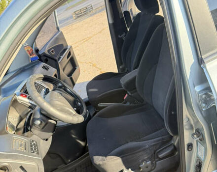 Синій Хендай Туксон, об'ємом двигуна 2 л та пробігом 203 тис. км за 7800 $, фото 15 на Automoto.ua