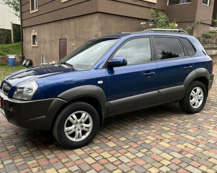 Синий Хендай Туксон, объемом двигателя 1.98 л и пробегом 230 тыс. км за 6555 $, фото 2 на Automoto.ua